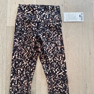 Lululemon Wonder Train HR Crop 21" Size 4